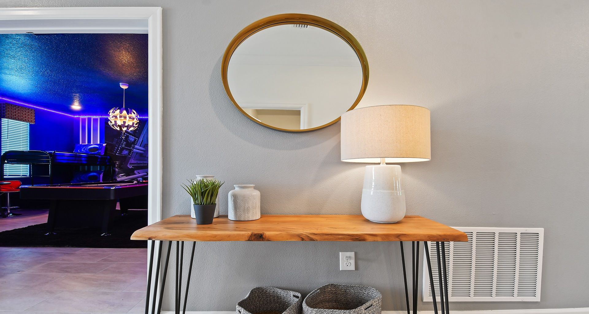 Chic mirror and tasteful decor elements, adding a touch of style and sophistication.