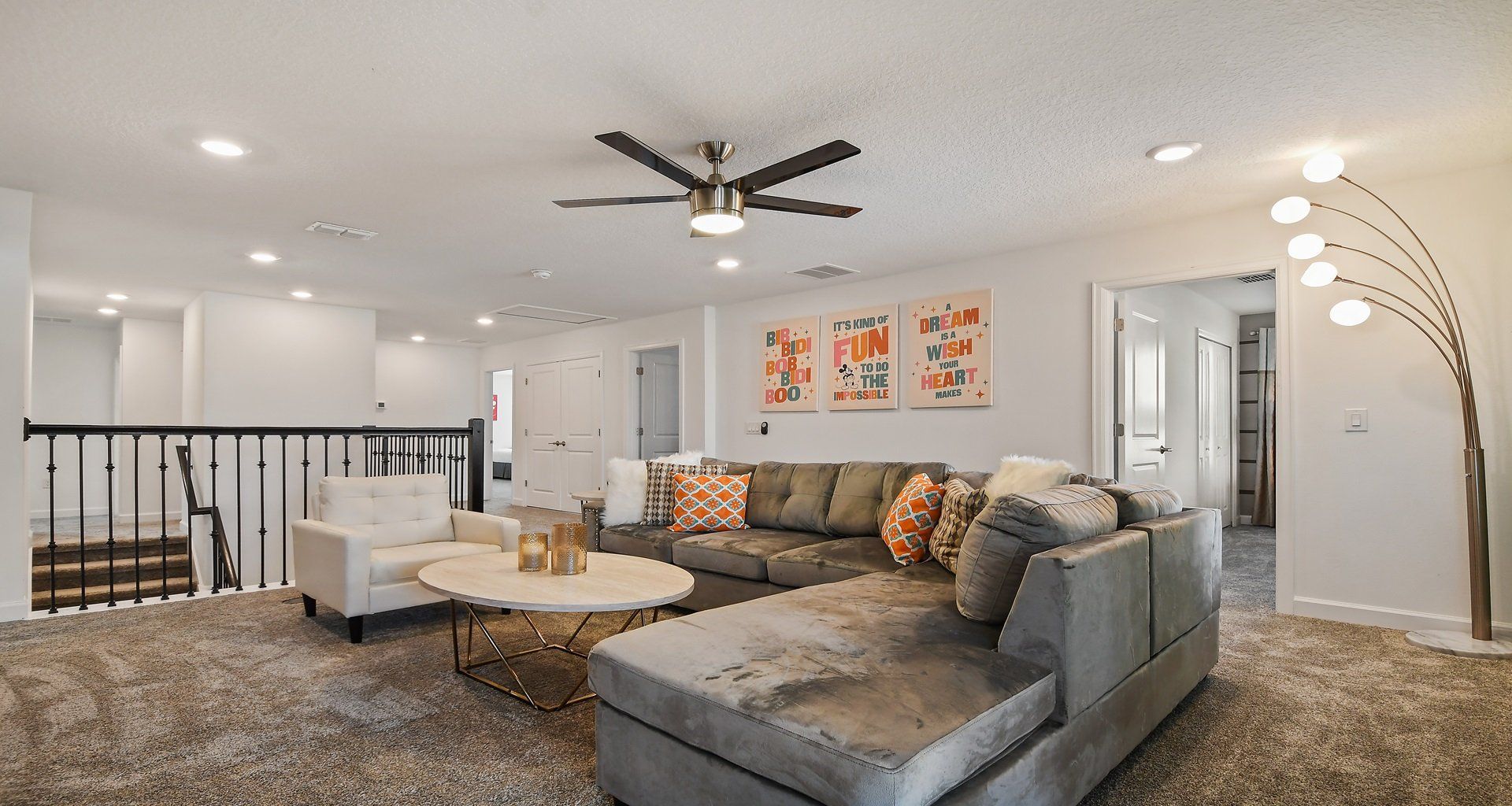 Relaxing lounge area adorned with a comfortable sofa, creating an inviting space for unwinding.