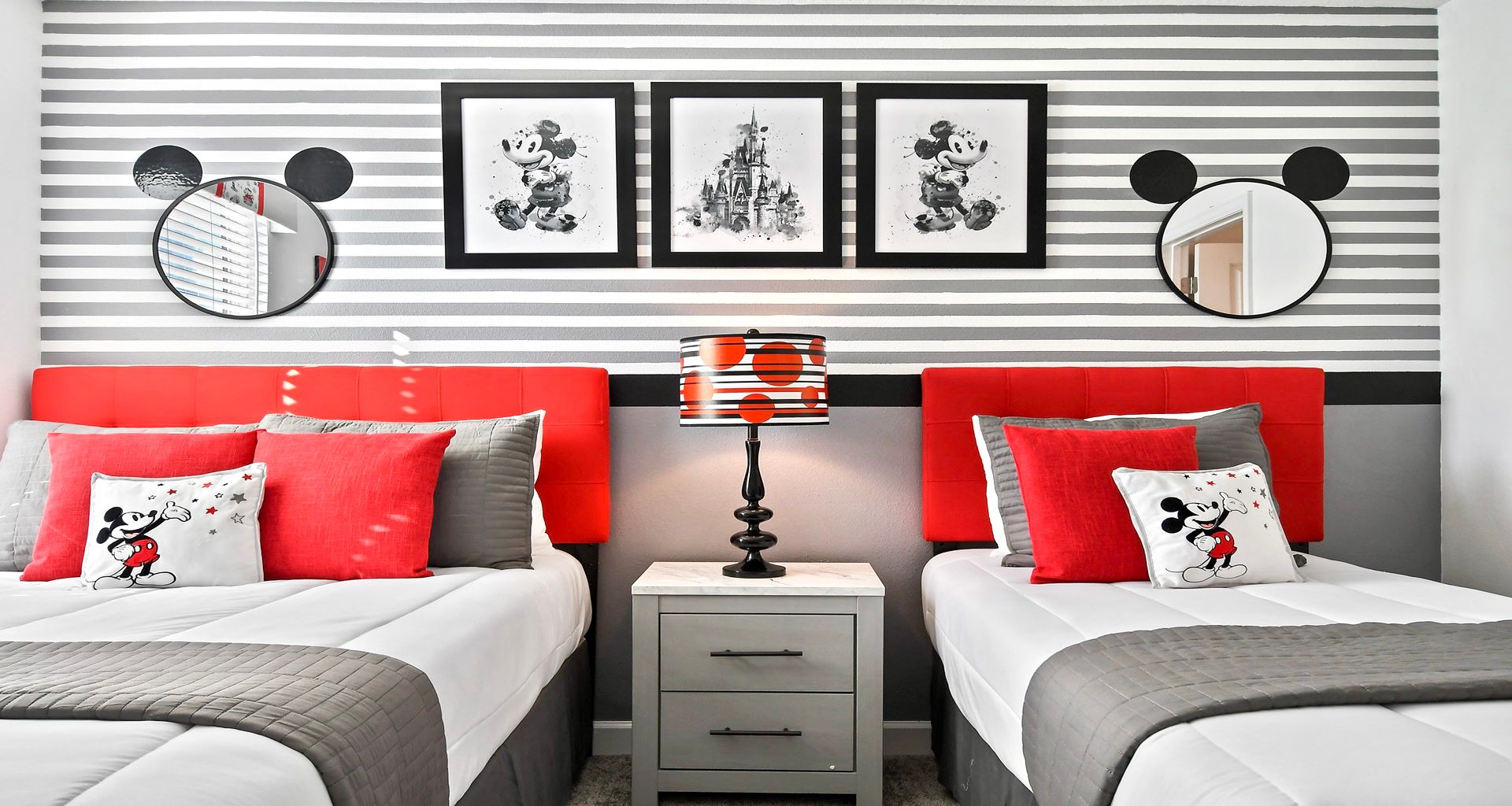 Experience the magic with a Mickey Mouse-themed bedroom, where iconic ears, vibrant colors, and playful decor bring the beloved Disney character to life.