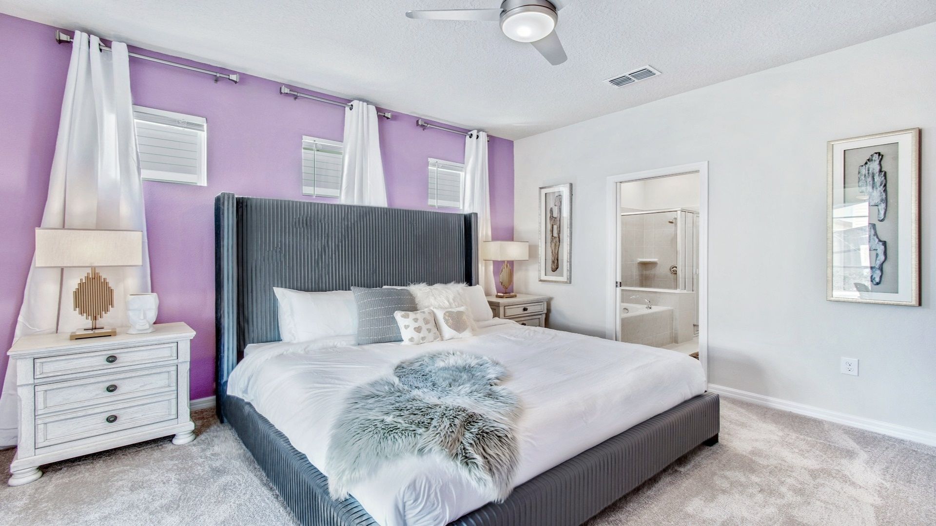 First floor bedroom with king bed and connected bathroom.