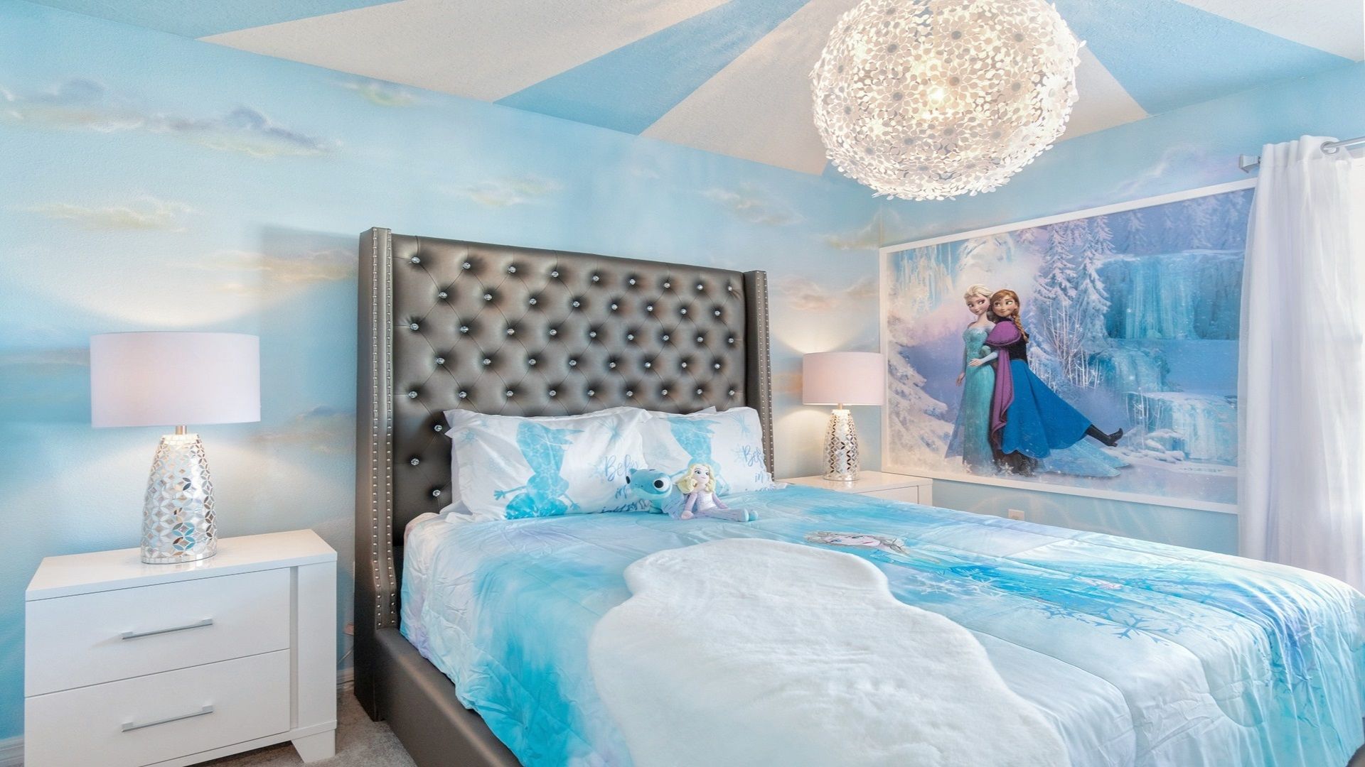 Frozen themed room includes flat screen TV.