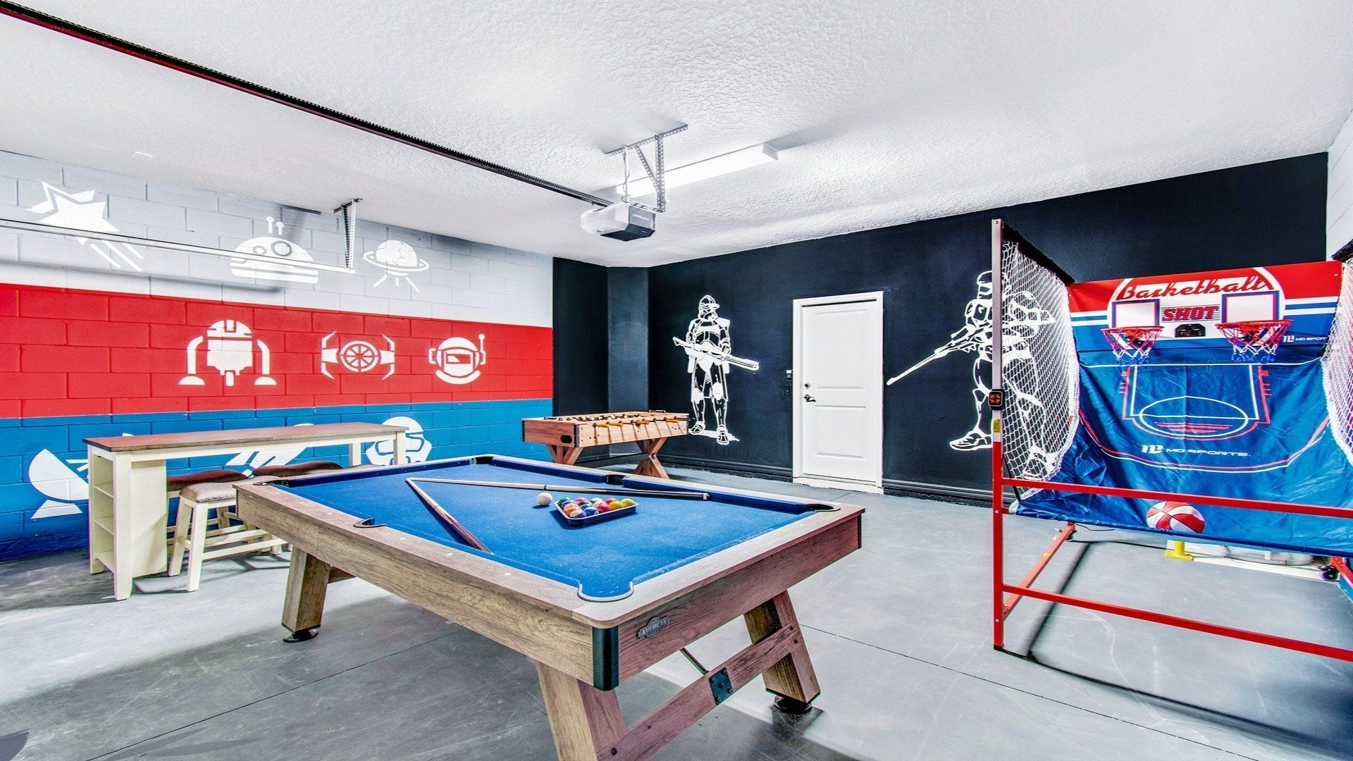 Enjoy in the game room which includes pool table and foosball table.