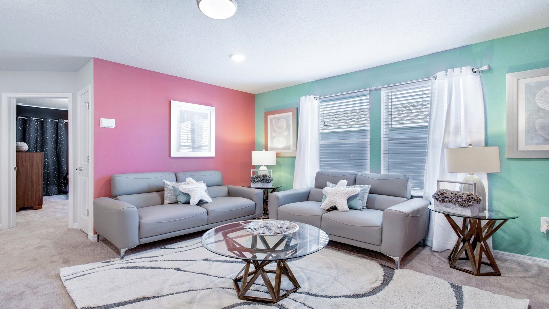Upstairs loft room with comfortable couches.