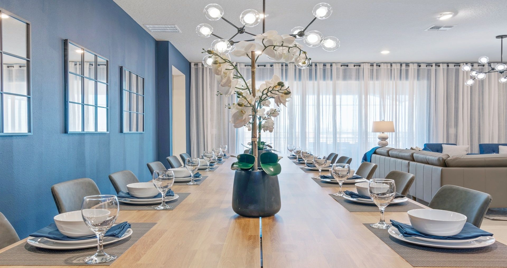 Dining Table: Spacious and accommodating, the 12-seater table provides ample room for large gatherings.