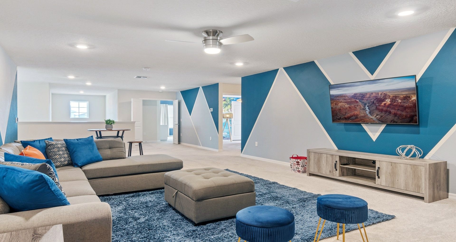 Lounge Area: Comfortable space equipped with a TV