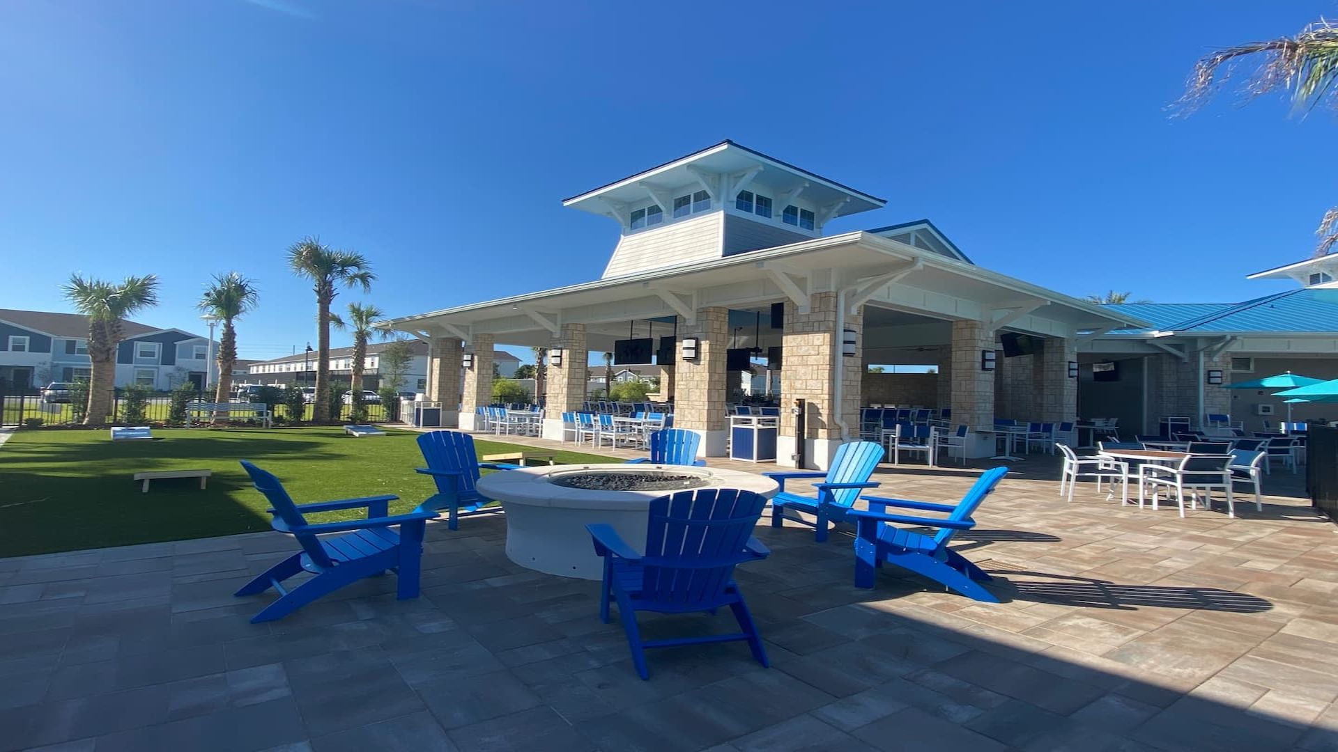 Resort Fire Pit: Gather around warmth in style with comfortable seating.