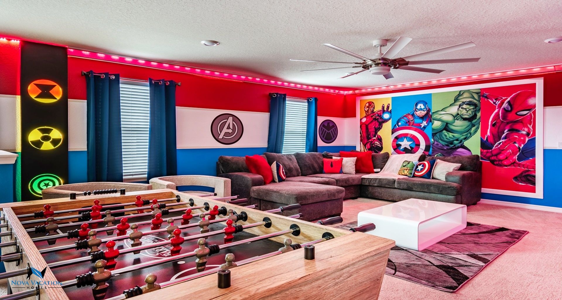 Avengers themed loft room with a comfortable roomy couch.