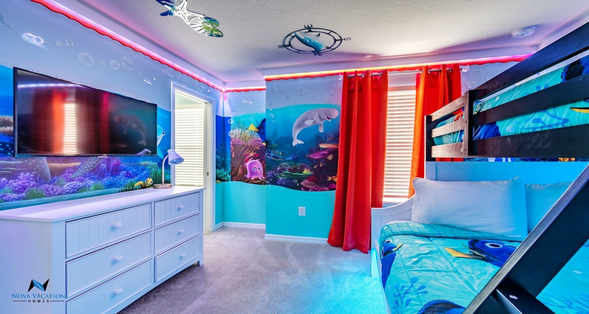 Finding Dory themed bedroom with a bunkbed offering full and twin beds.