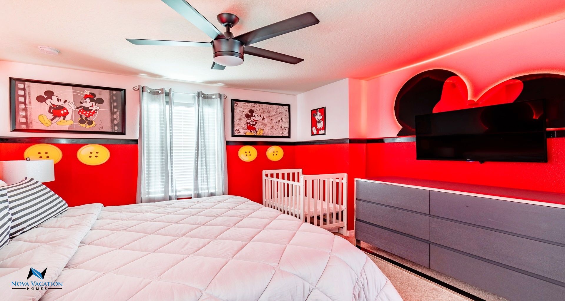 Mickey Mouse themed bedroom offering a spacious king sized bed.