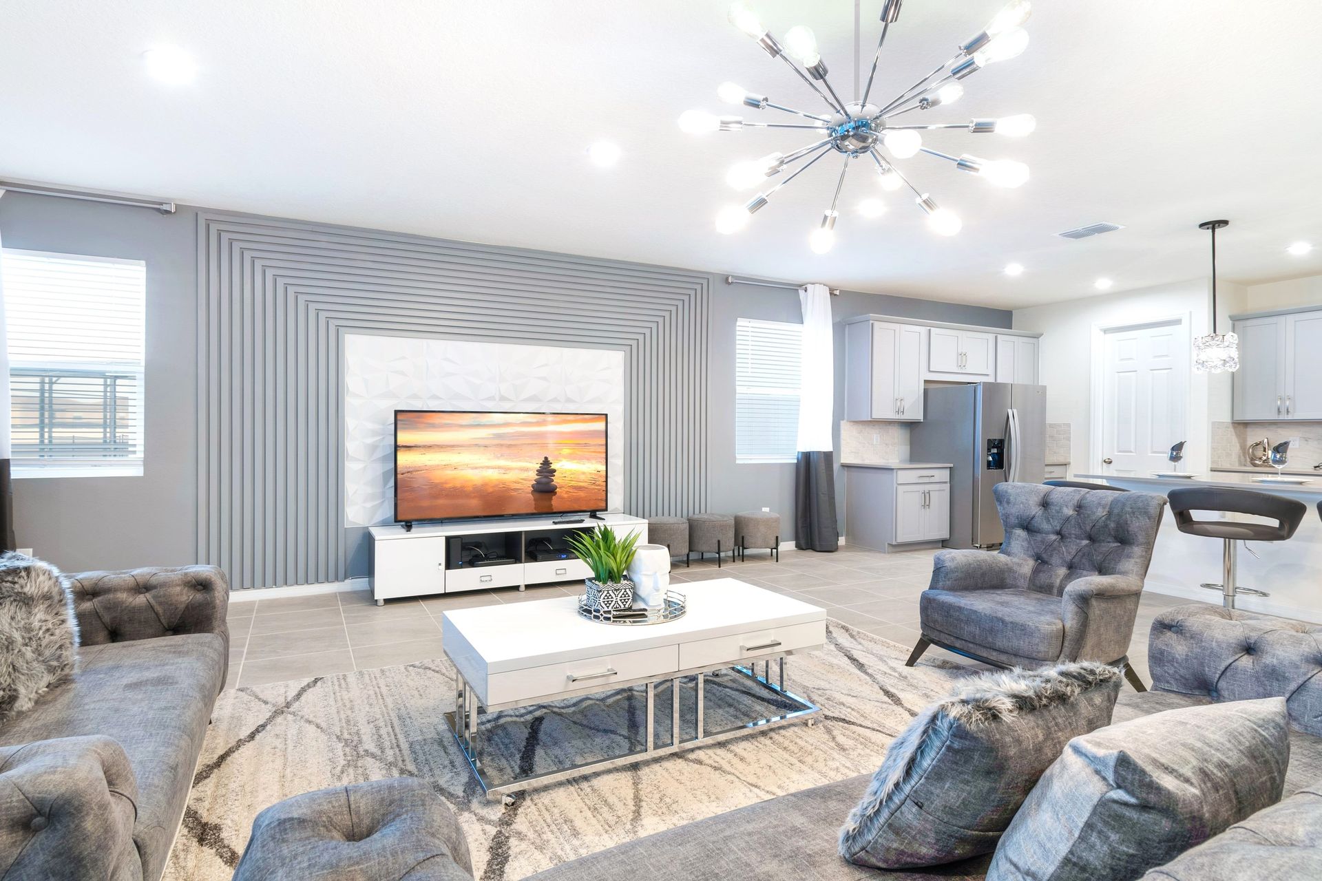 Modern open-concept living room with stylish decor & cozy vibes!