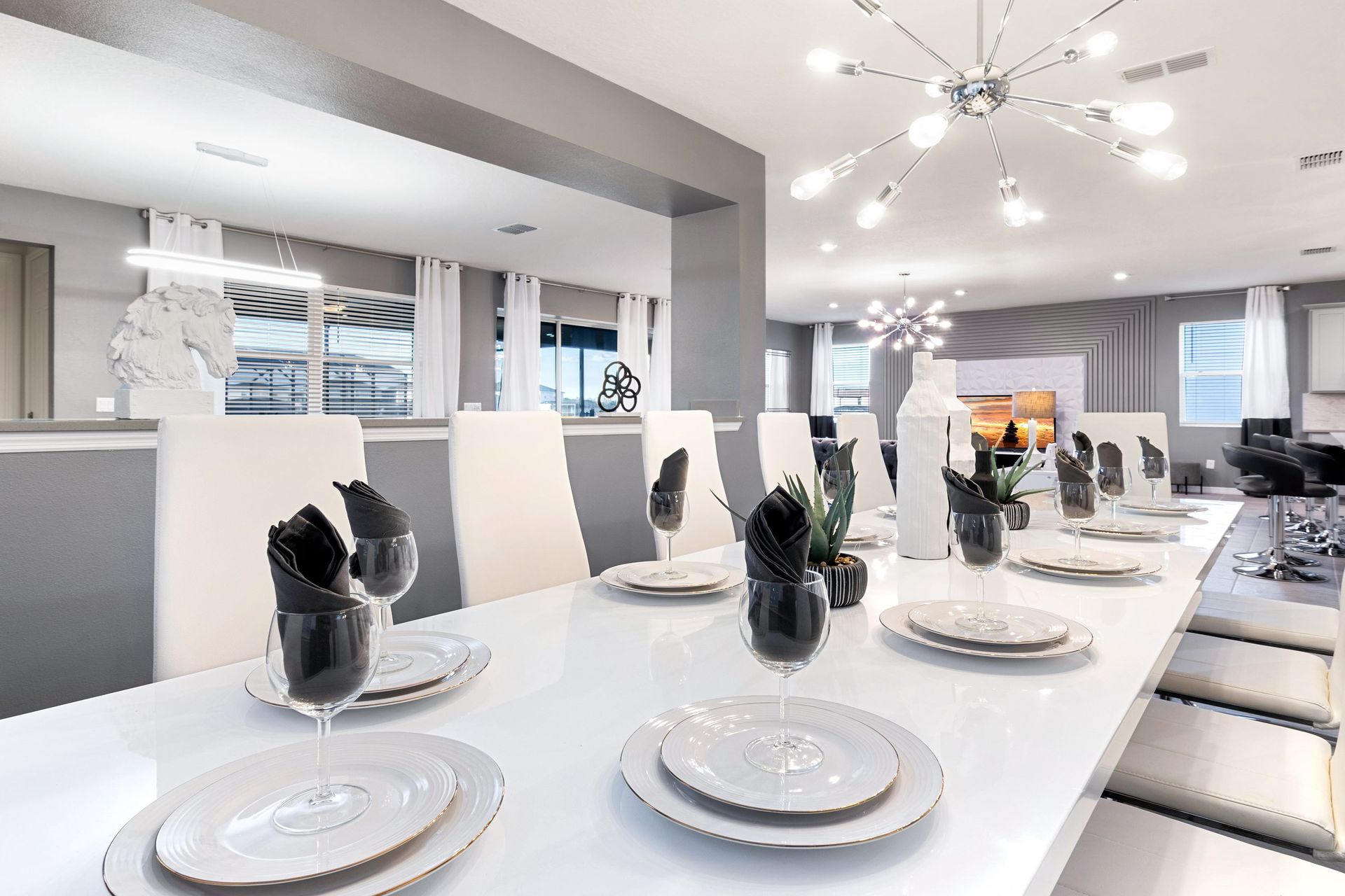 Elegant dining area with sleek decor, perfect for group gatherings!