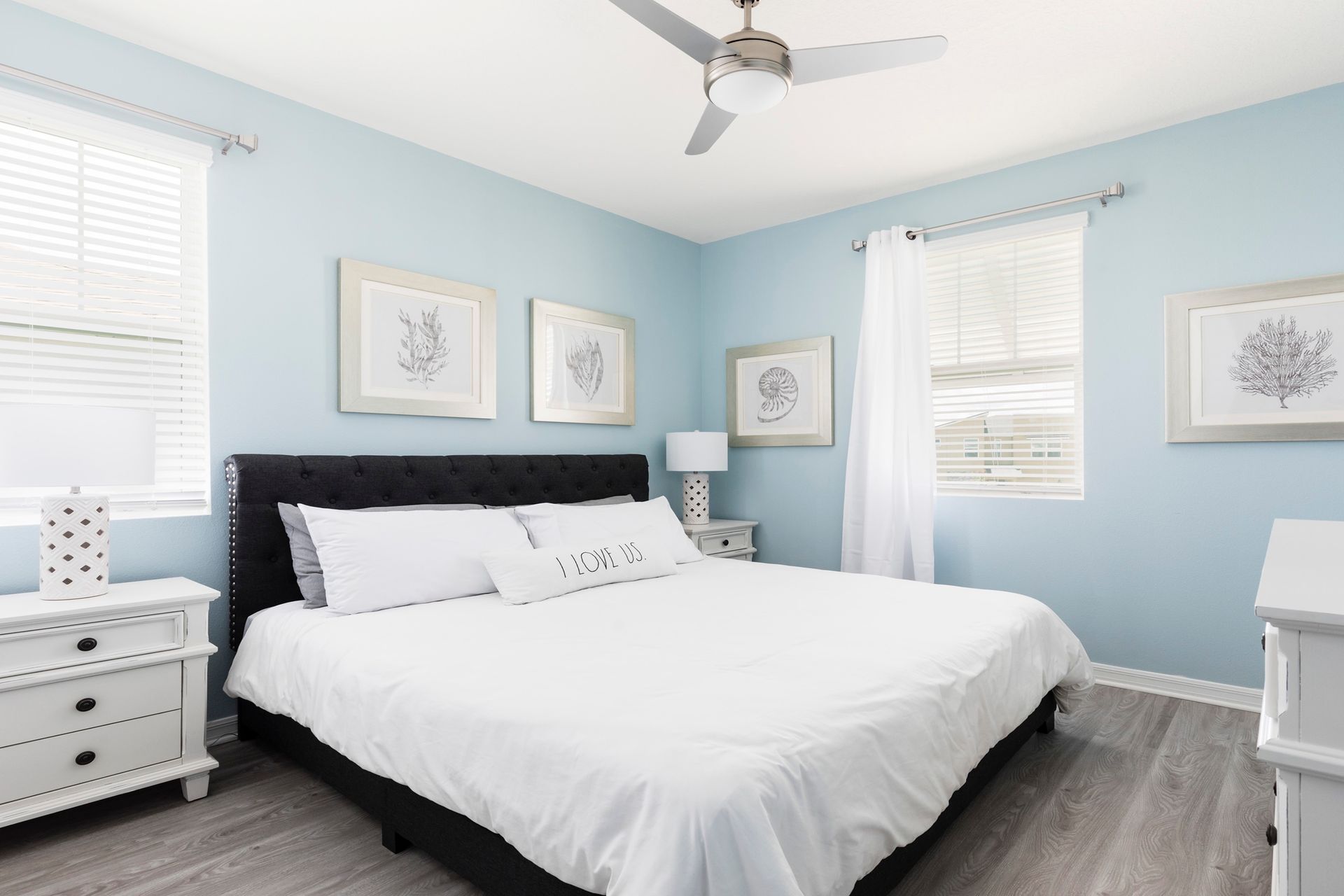Cozy coastal bedroom with soft hues and serene, airy vibes!