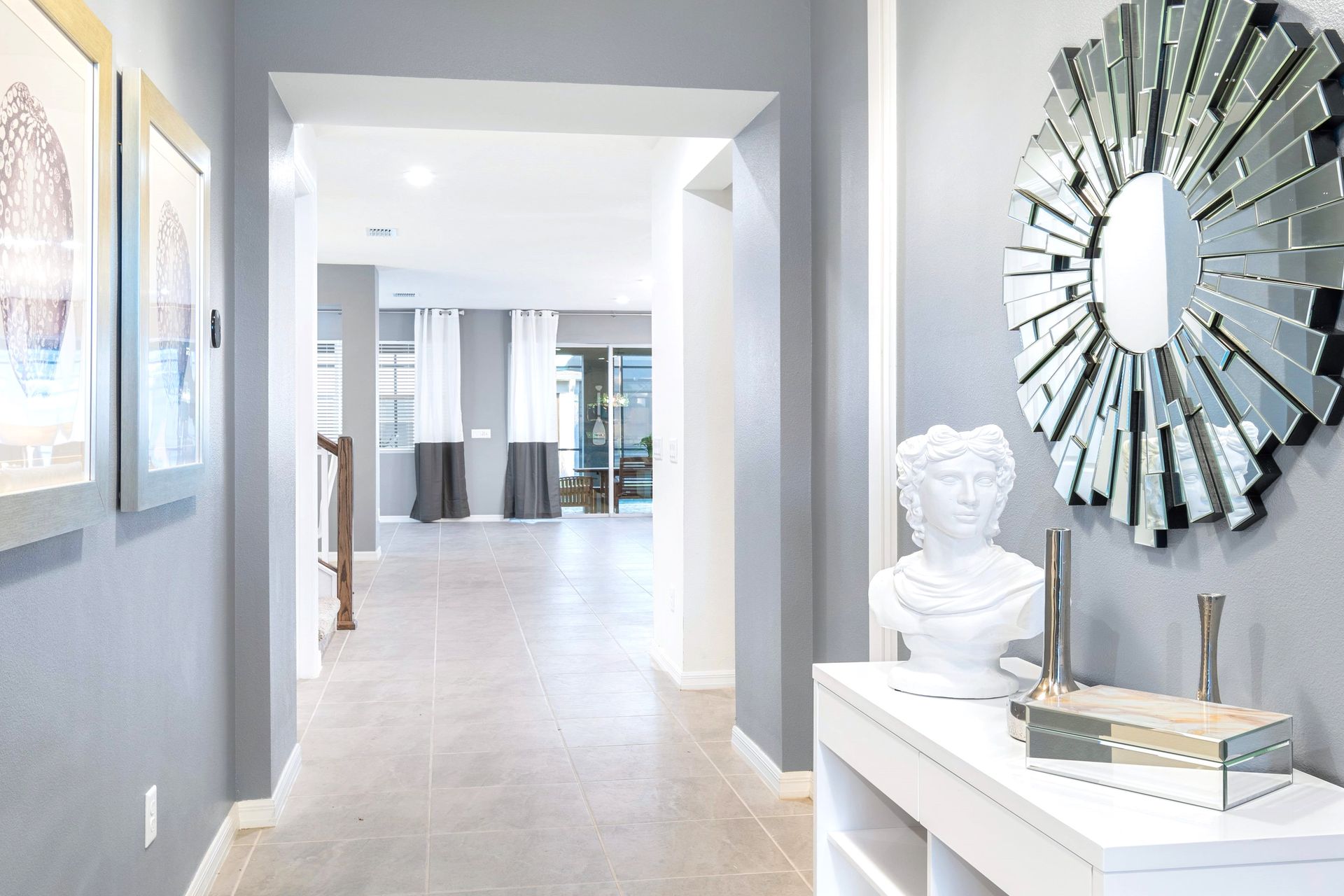 Stylish hallway with modern decor, elegant accents, and bright ambiance!