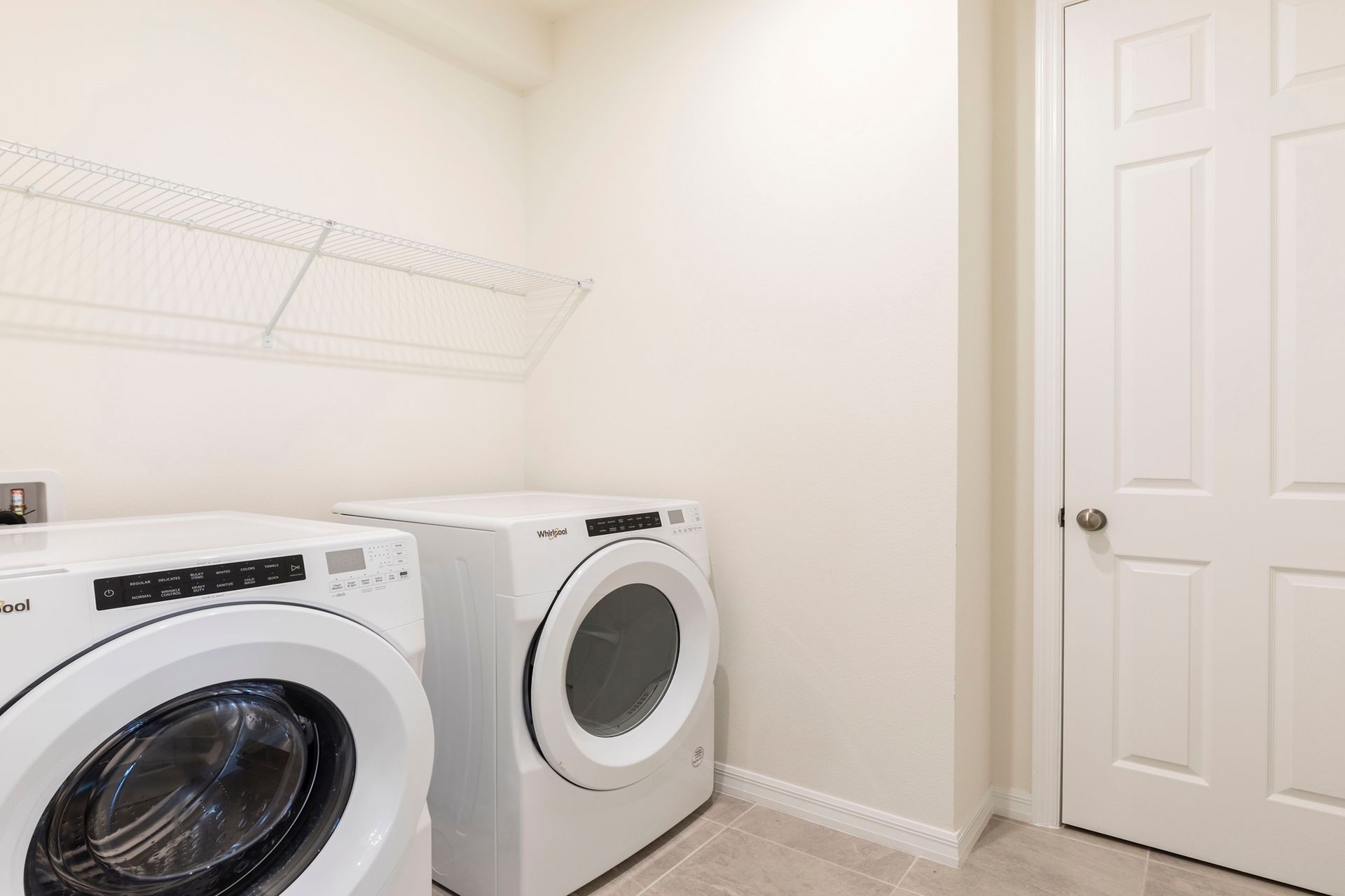 Convenient laundry room with modern washer and dryer for your stay!