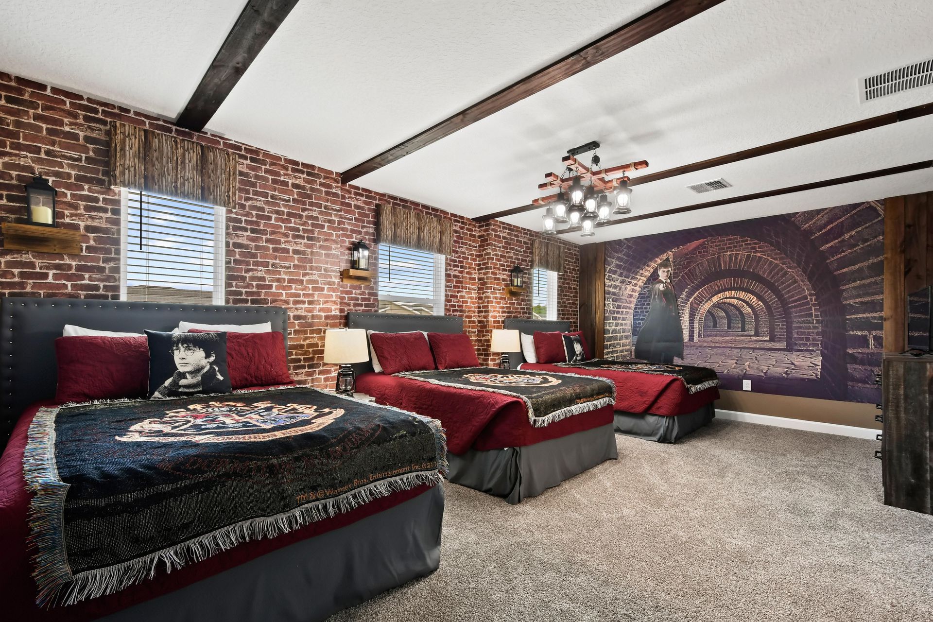 Magical wizard-themed bedroom with three cozy beds, brick walls, and enchanted decor.