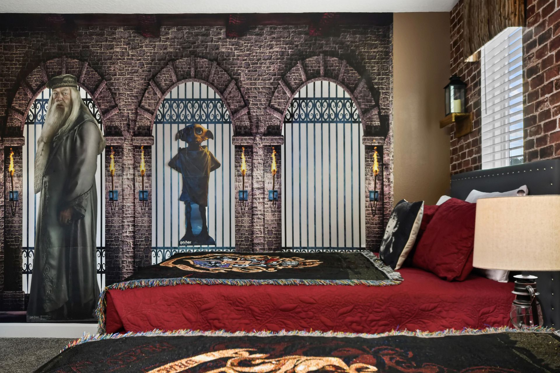 Magical wizard-themed bedroom with three cozy beds, brick walls, and enchanted decor.