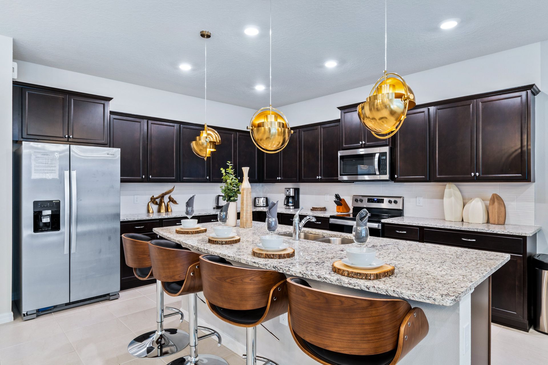Cook with ease in our felly equipped modern kitchen, complete with high -end appliances, ample counter space, and a sleek design.