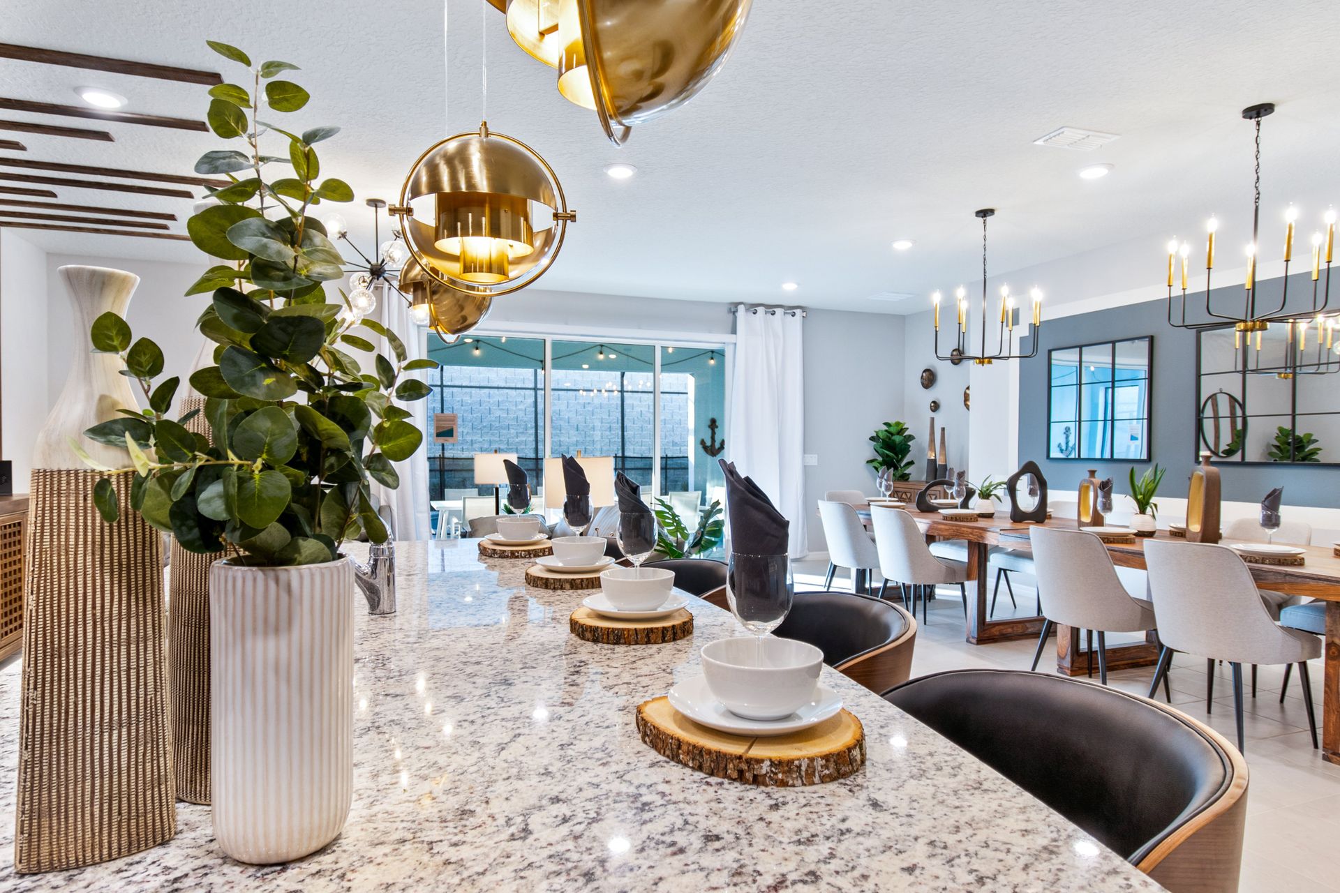 Elegant open kitchen & dining space with stylish décor, warm lighting & luxe vibes!