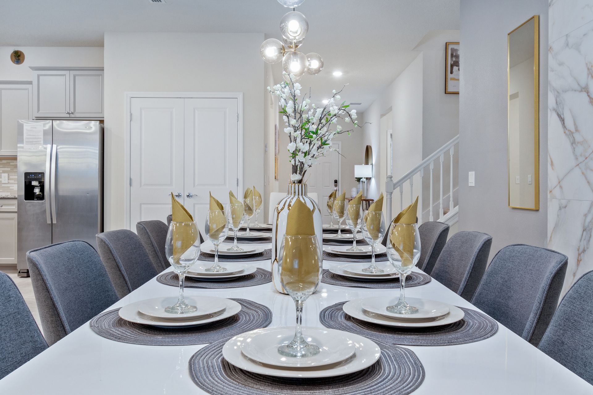 Beautifully set dining table with elegant decor, ready for a special meal.