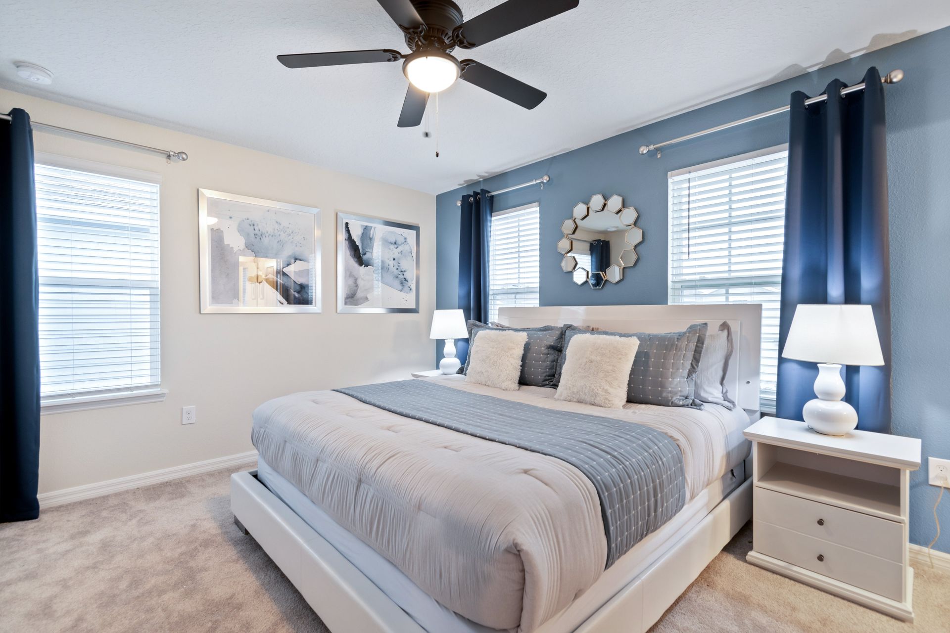 Bright and stylish bedroom with a king bed, modern decor, and cozy ambiance.