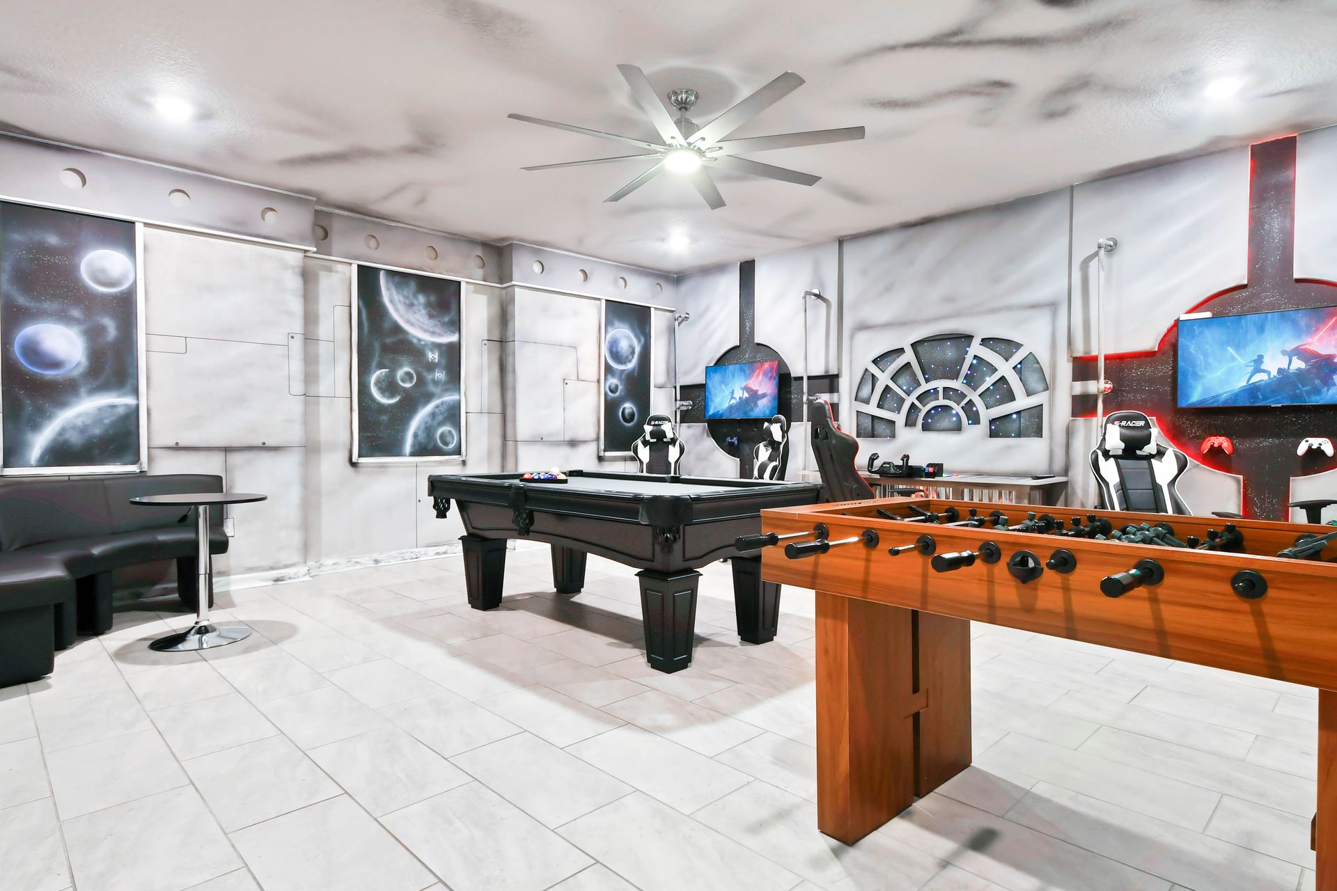 Ultimate Star Wars-themed game room with pool, foosball, gaming setups, and lounge!