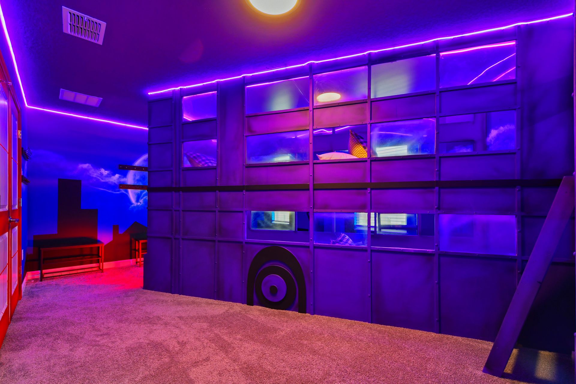 Futuristic bunk room with glowing neon lights, creative bus design, and cityscape vibes!