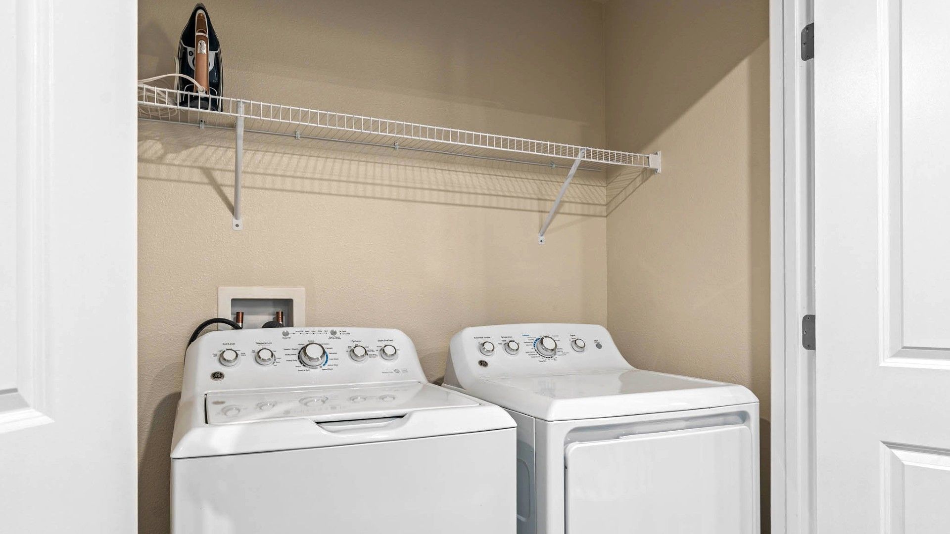 Laundry Room: Equipped with a washer for convenient and efficient laundry care.
