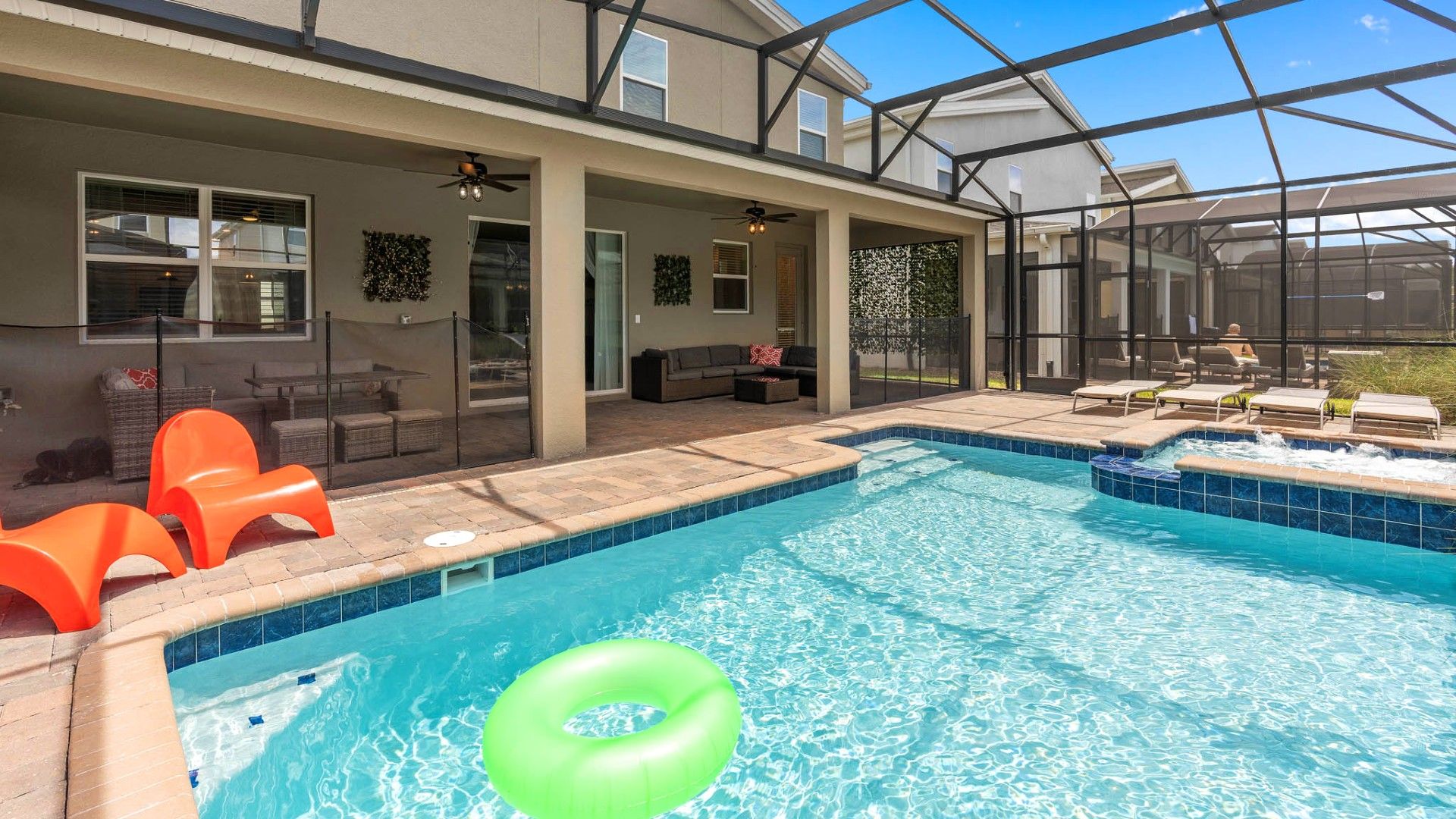 Relax by the private screened-in pool and spa with ample seating and outdoor fun!