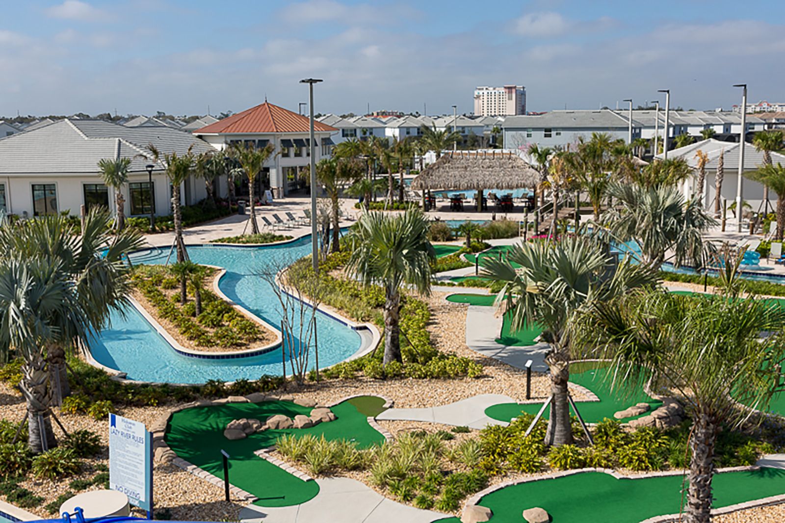 Enjoy endless fun with a lazy river, mini-golf, and tropical vibes all around!