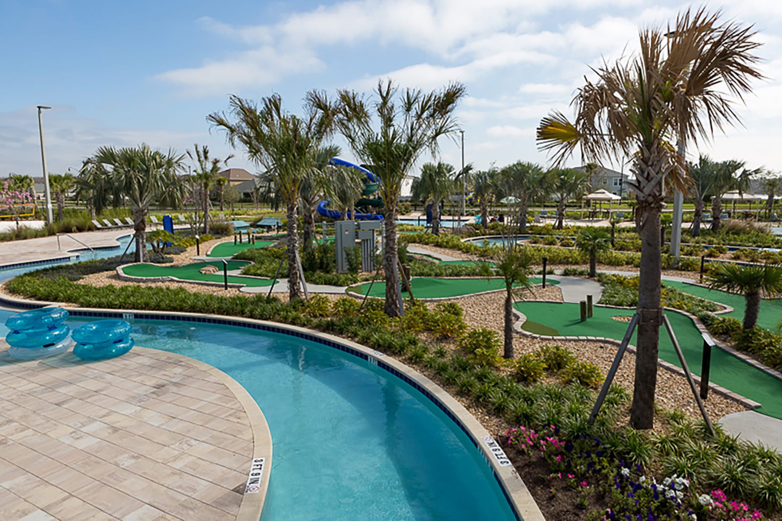 Enjoy endless fun with a lazy river, mini-golf, and lush tropical vibes!