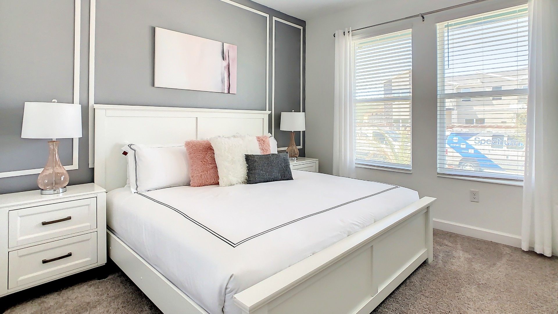 Chic, serene bedroom—dream in style with cozy, elegant comforts!