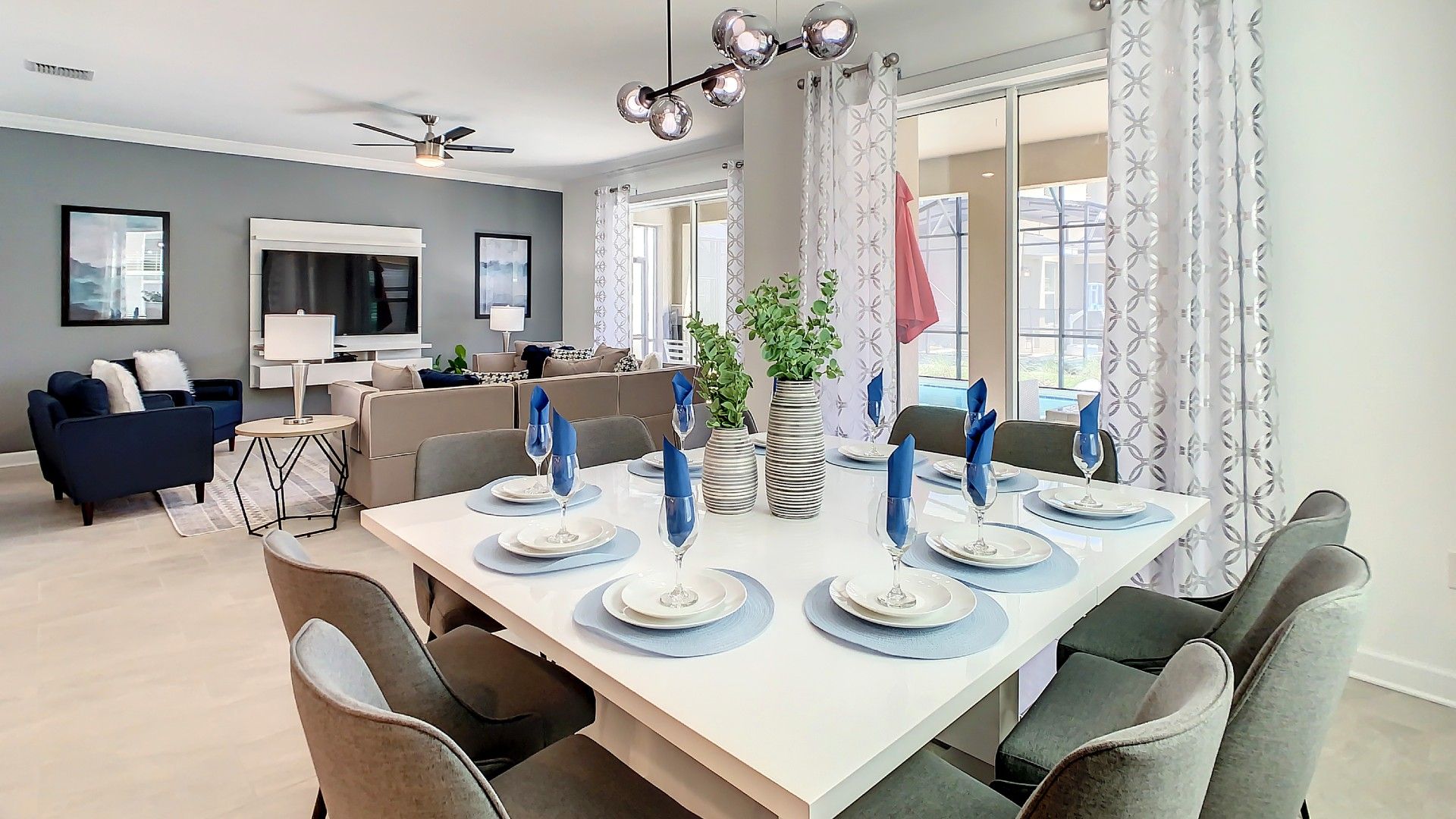 Elegant dining awaits! This beautifully set table in a chic, open-plan space is perfect for memorable meals with loved ones.