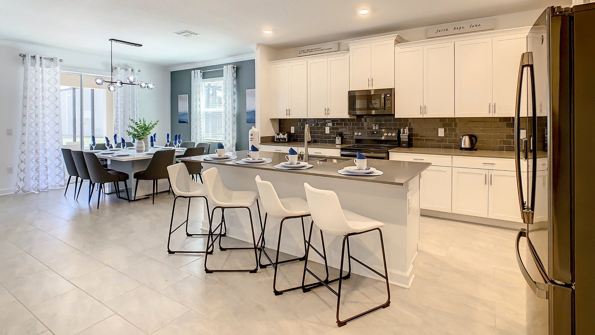 Sit up at the breakfast bar and keep the chef company