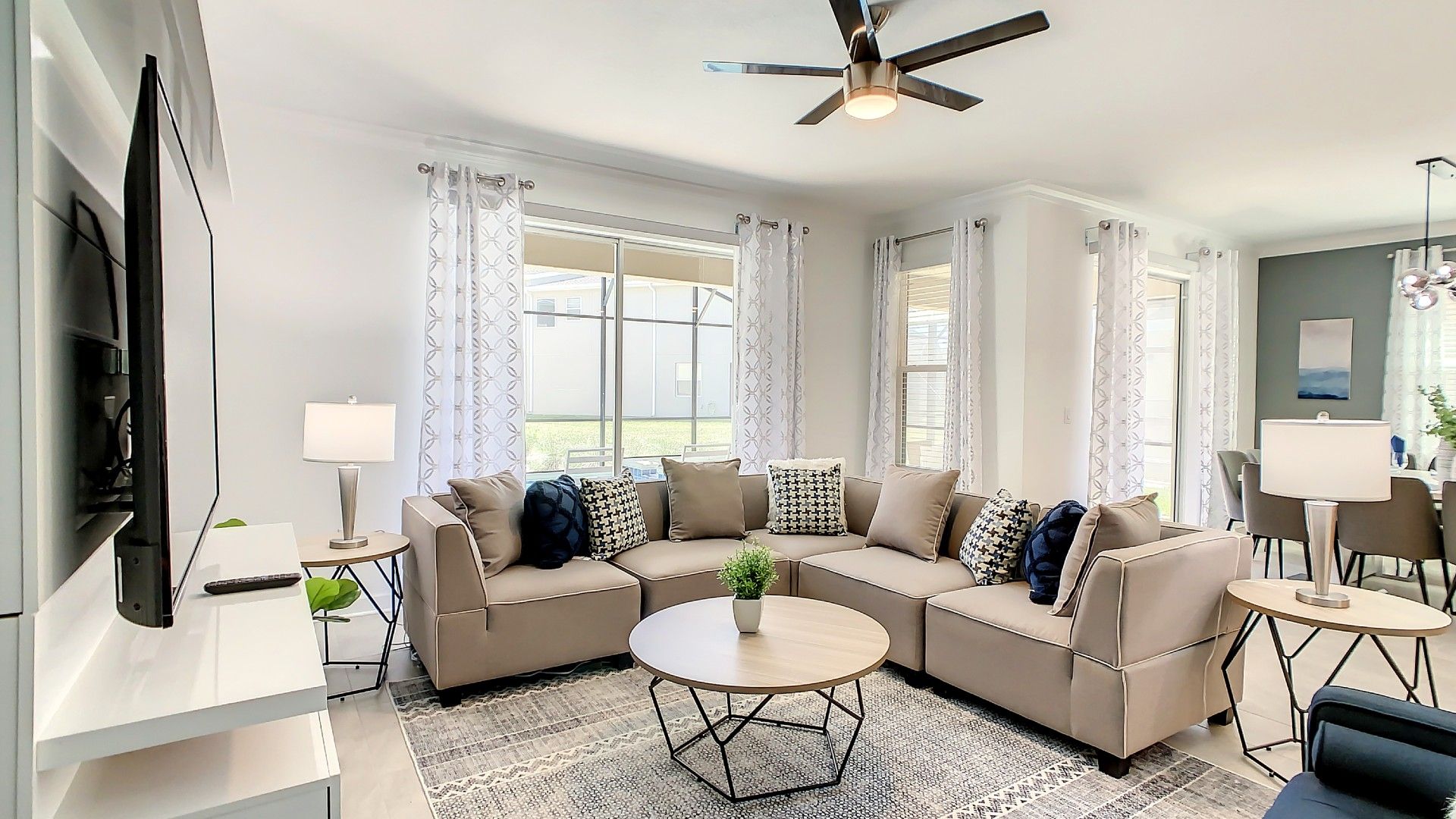 Relax in luxury! This airy living space blends modern design with comfort, perfect for socializing or a cozy night in.