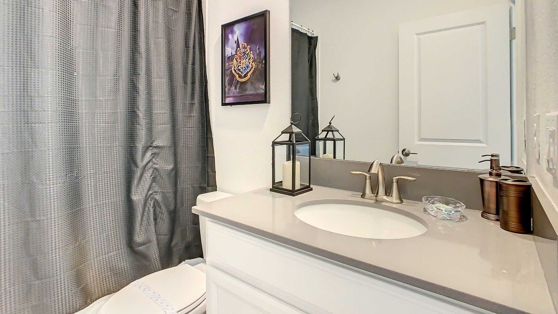Bright and clean bathroom with elegant granite countertops, perfect for refreshing mornings.