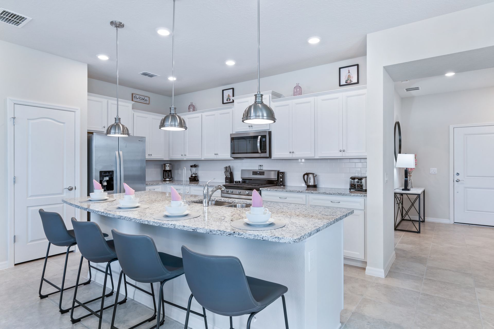 Culinary space featuring a breakfast bar for convenient dining