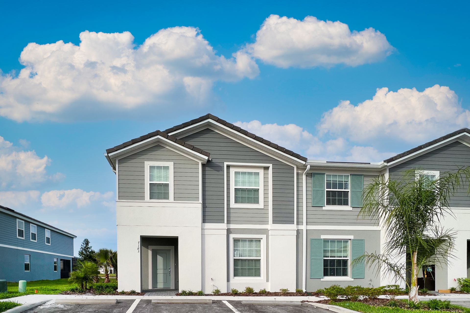 Elegant 5-bedroom home adorned in a sophisticated white and grey color palette, exuding timeless beauty and modern charm