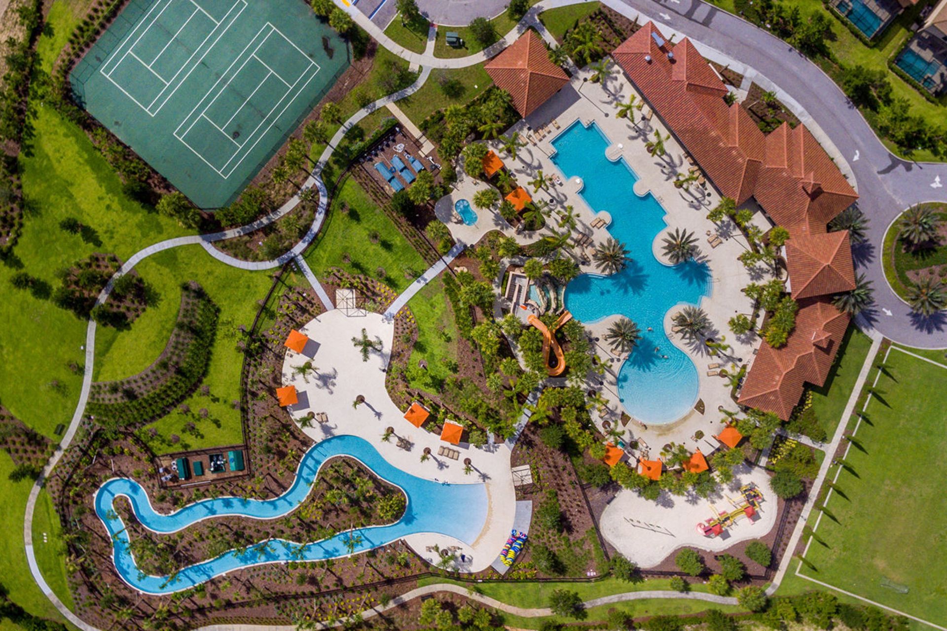 Resort Amenities - Dive into relaxation in our inviting resort pool, offering you the perfect retreat to unwind and soak up the sun during your stay.