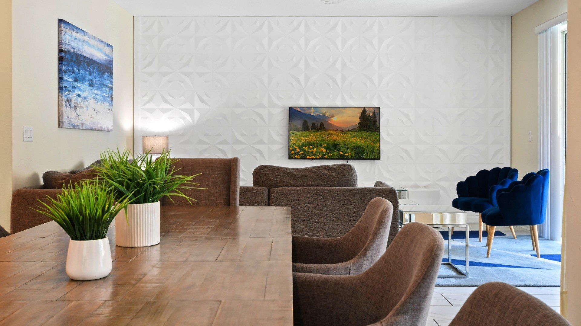 Modern open-concept space with stylish decor, cozy seating, and a relaxing vibe