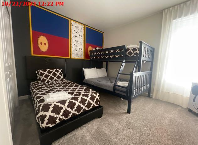 Fun and cozy themed bedroom with bunk beds, playful decor, and a welcoming vibe