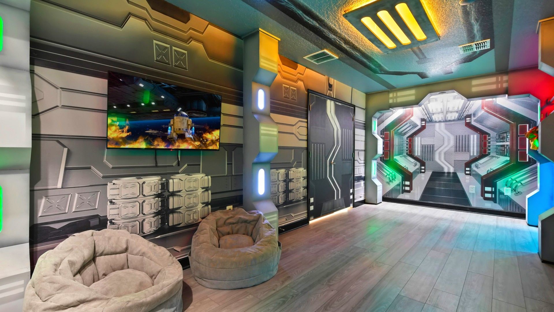 Futuristic space-themed room with immersive décor, cozy seating, and vibrant lighting.
