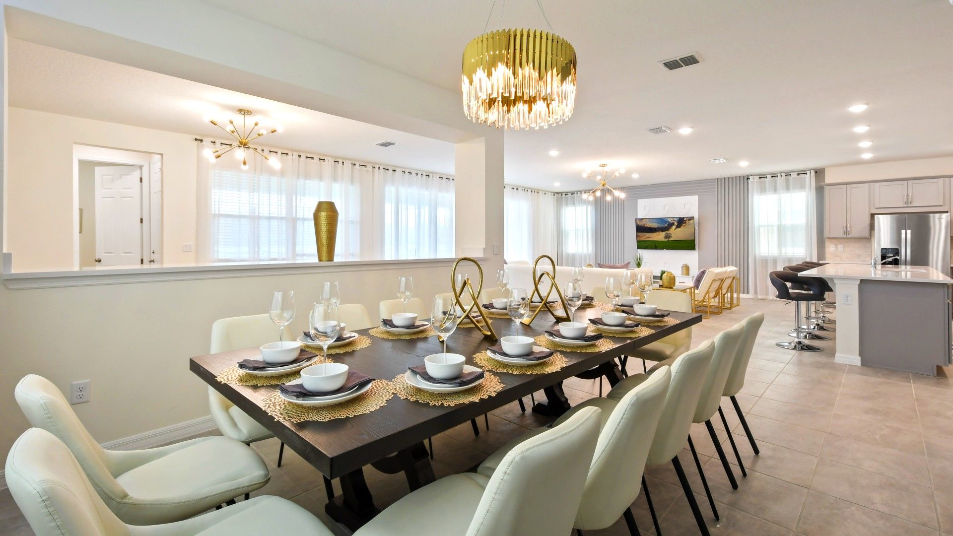 Spacious open-concept dining area for 12, with modern touches and elegant decor!