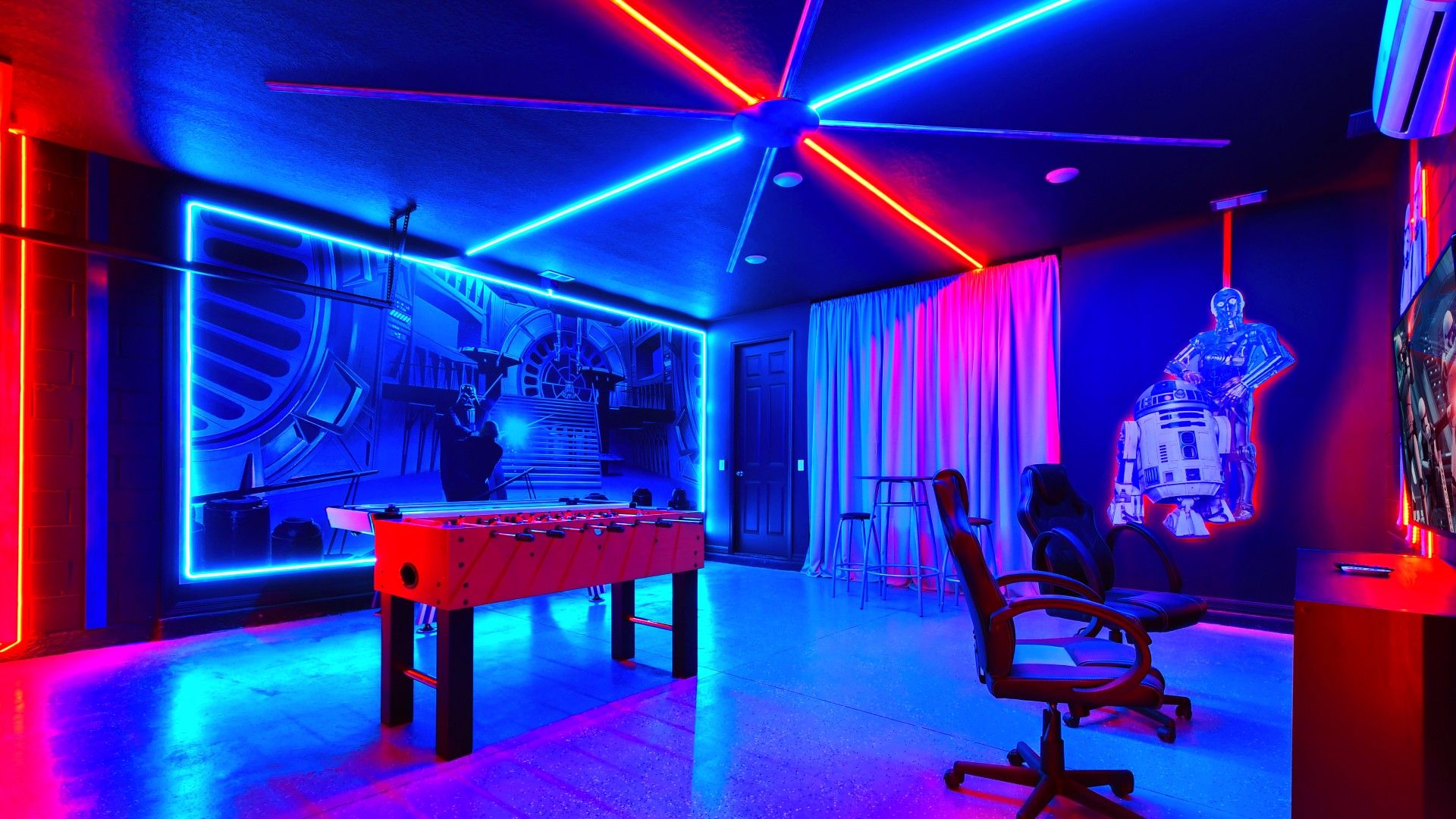 The game room is stylishly furnished with Star Wars theme with cool lights