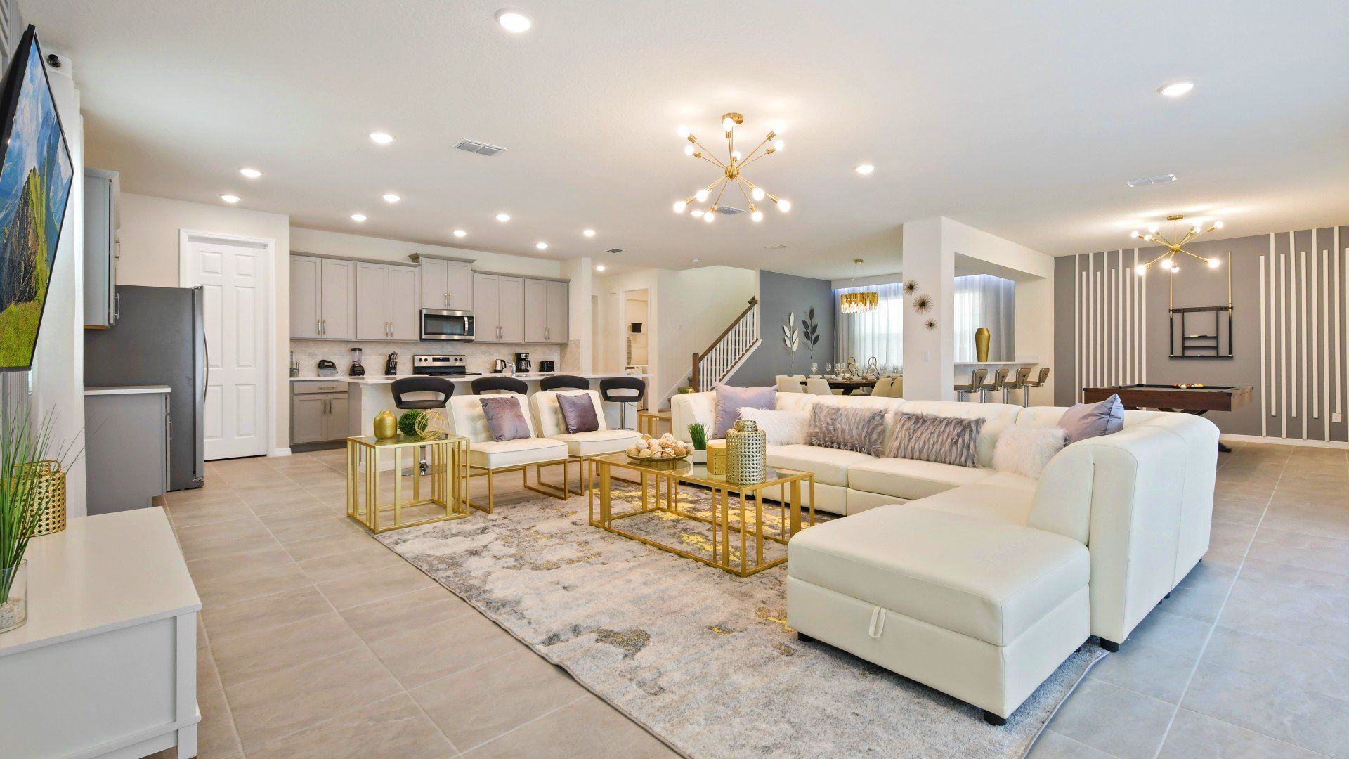 Spacious living room area with cozy sofa, perfect for family reunion