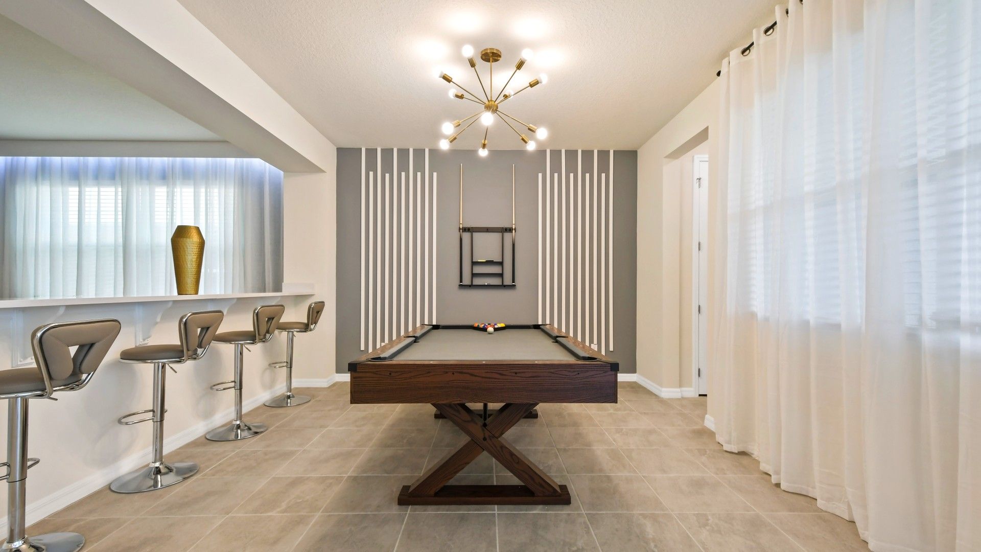 Have a hit of pool with friends in the corner of the living room