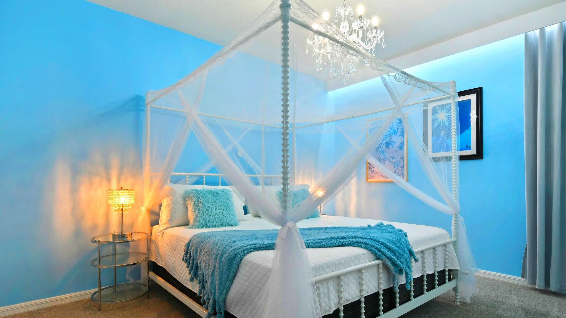 Whimsical Frozen-inspired bedroom with a dreamy canopy bed and magical decor!