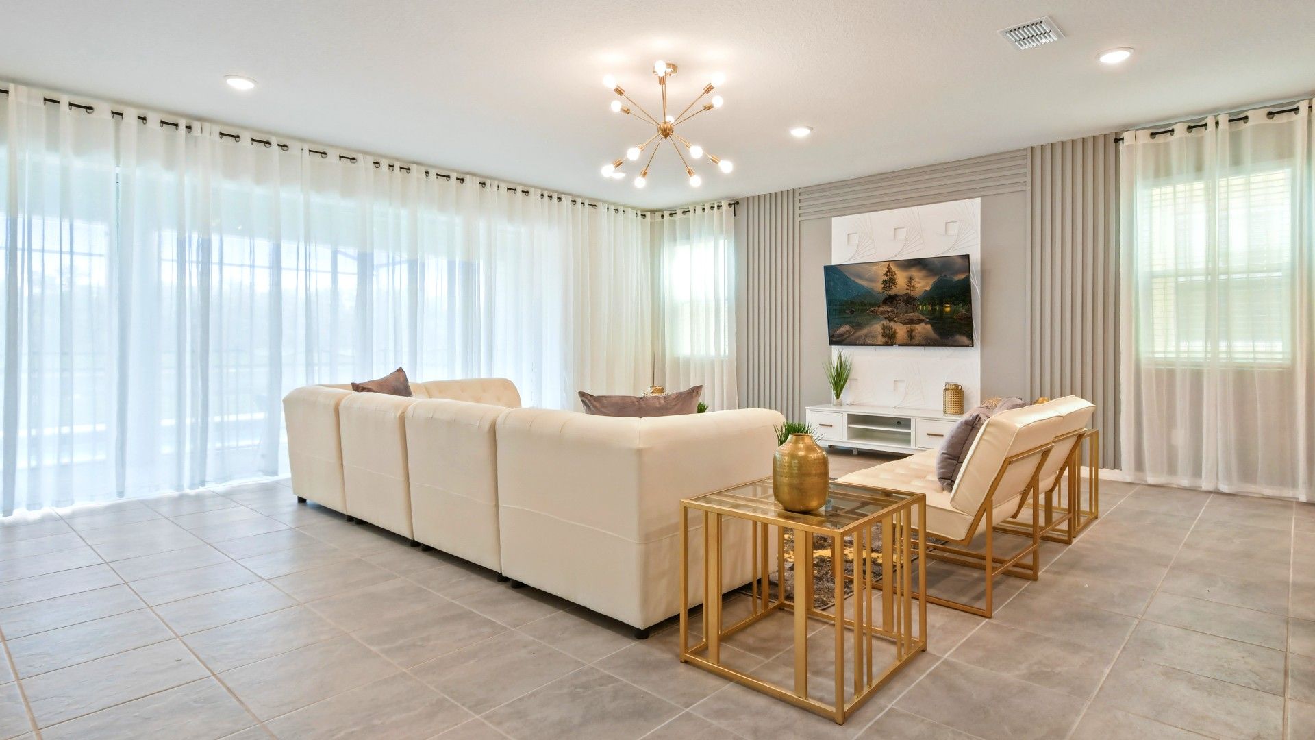 Modern, elegant living space with plush seating, chic decor, and serene vibes!