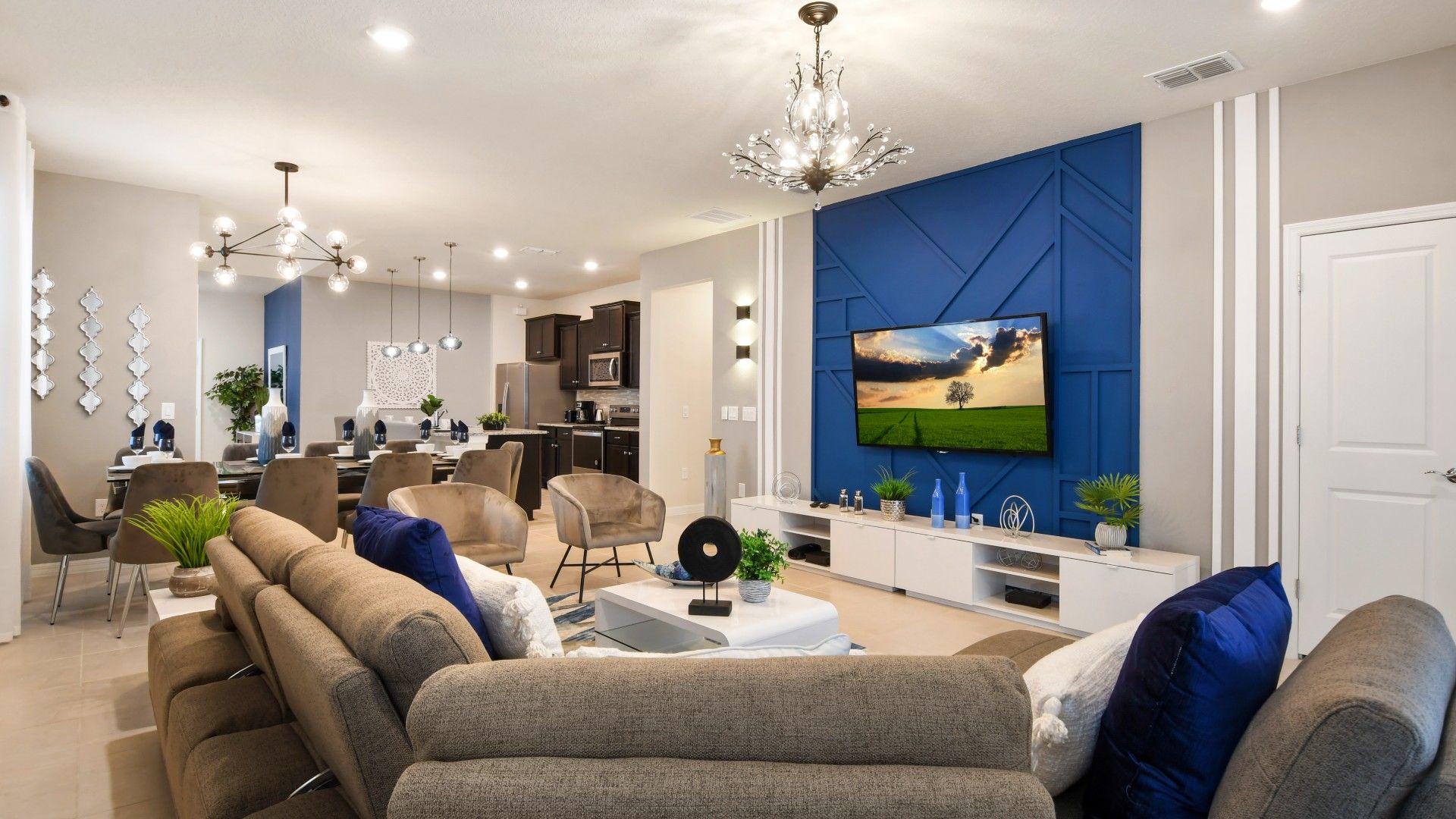 Spacious living room area with cozy sofa, perfect for family reunion