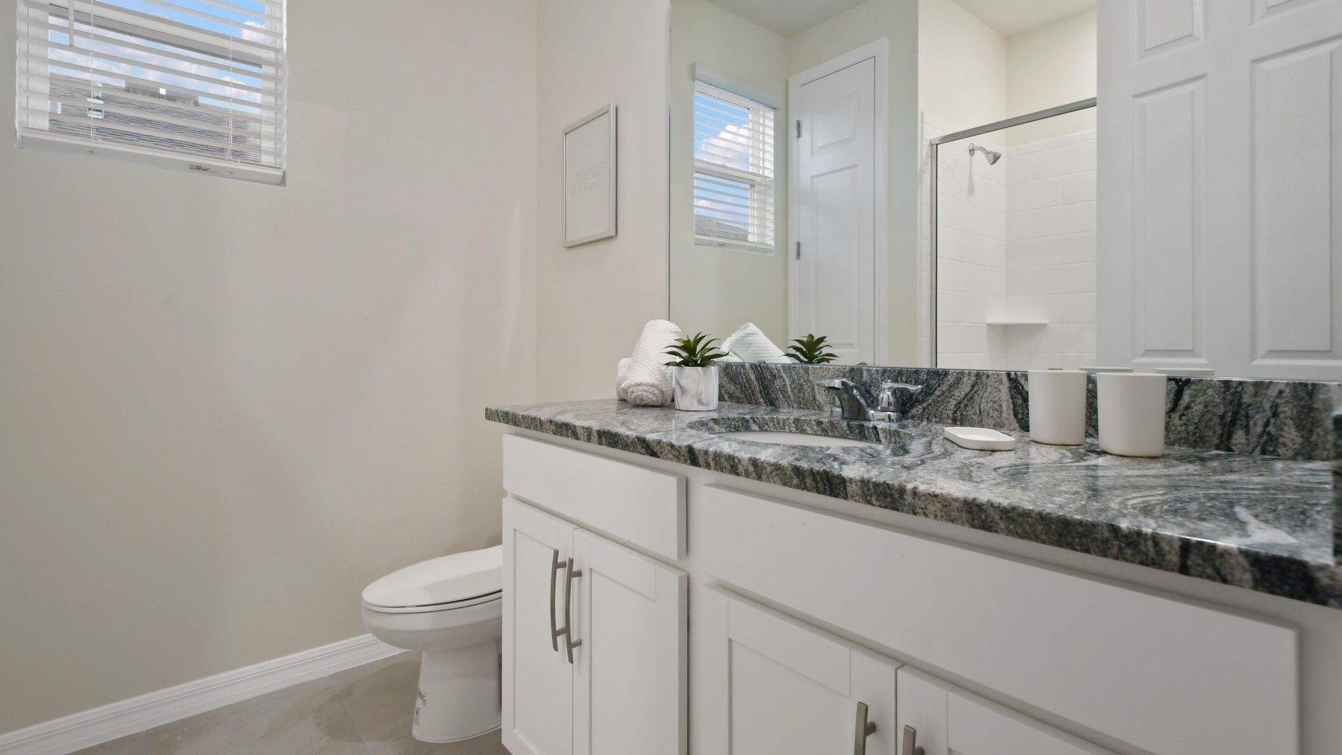 Indulge in the luxury of a full bathroom, complete with modern amenities and elegant finishes, providing a spa-like oasis for your personal comfort and relaxation