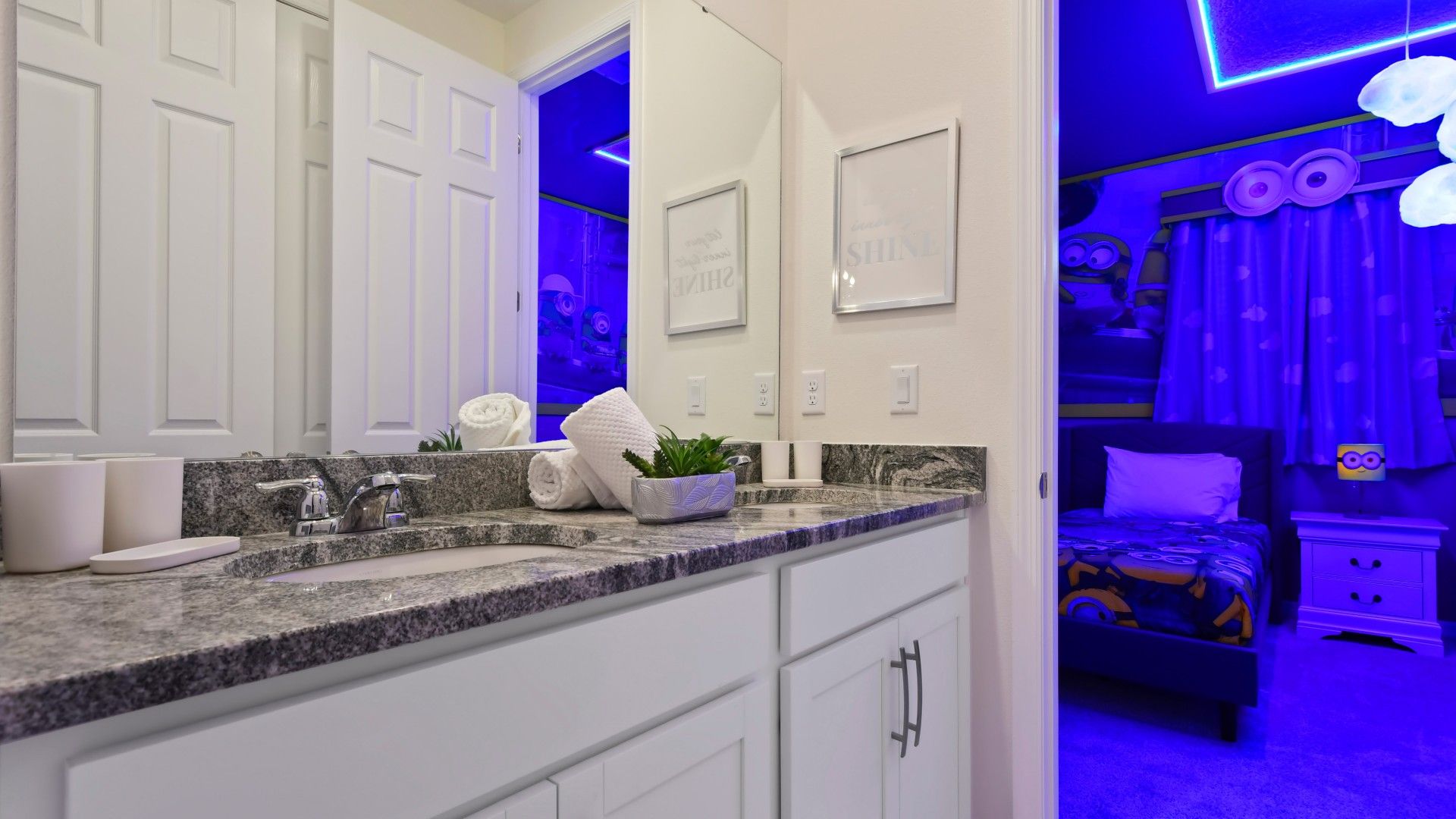 Enjoy the convenience of a bathroom seamlessly connected to the Minion-themed room.